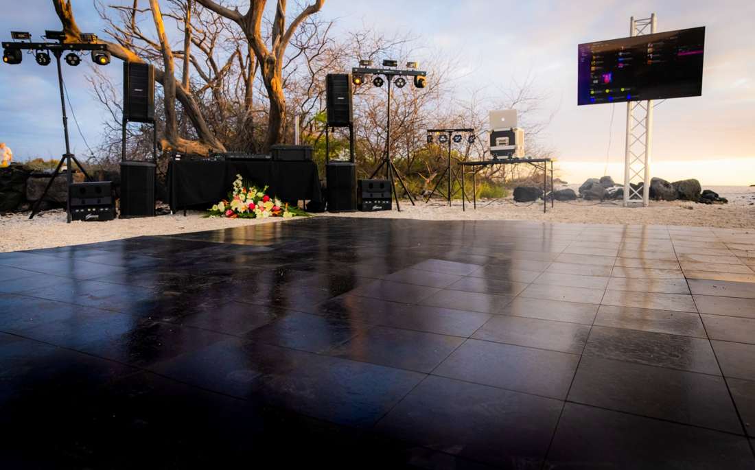 Black dance floor at an outdoor venue